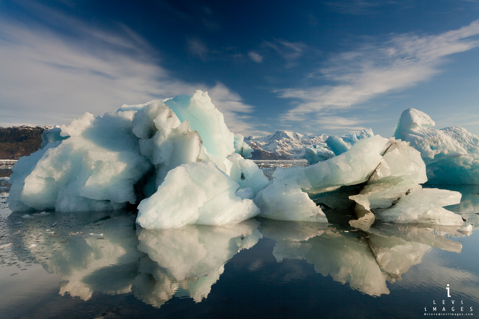 Icebergs reflected in melt water from Columbia Glacier. Prince William Sound, Alaska