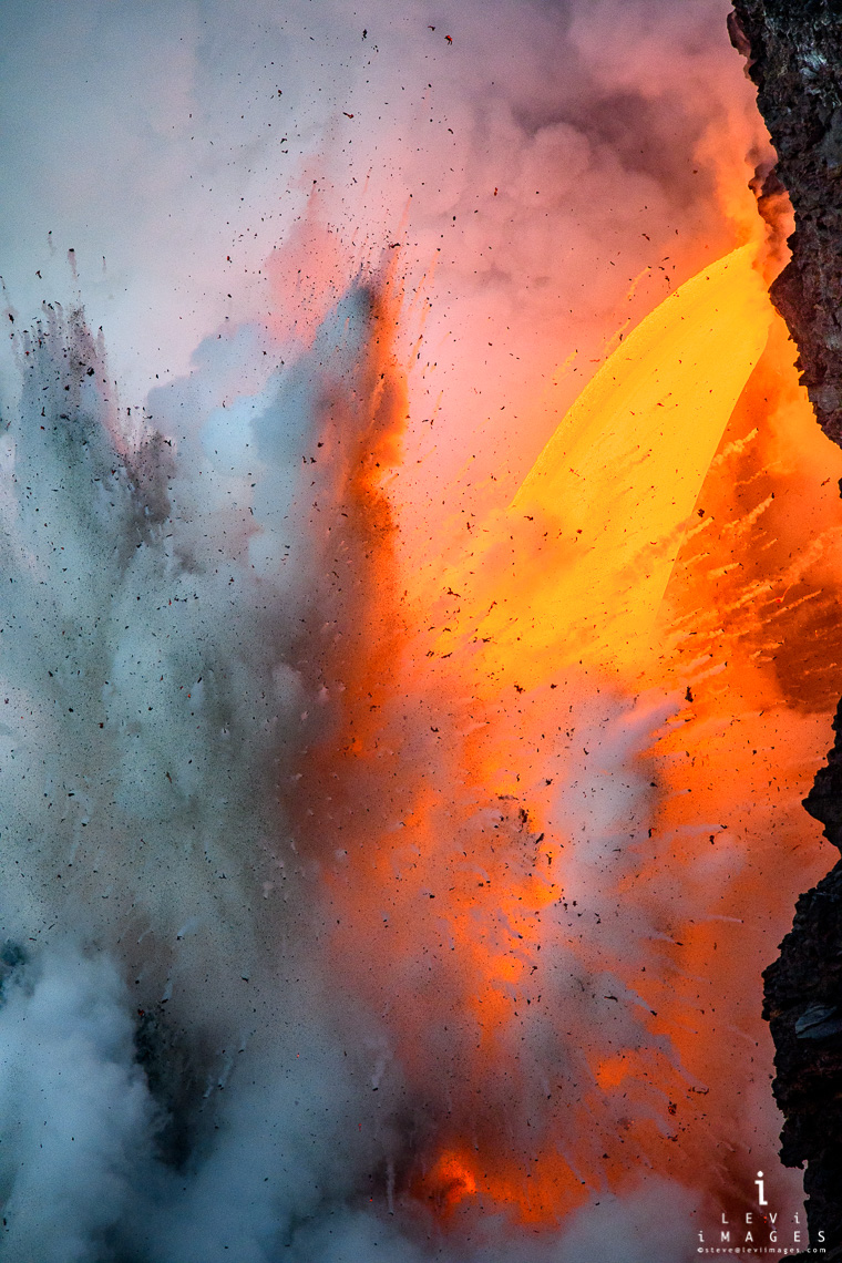 Rare lava fire hose explosively flows into the ocean, Hawaii Volcanoes National Park, Big Island, Hawaii