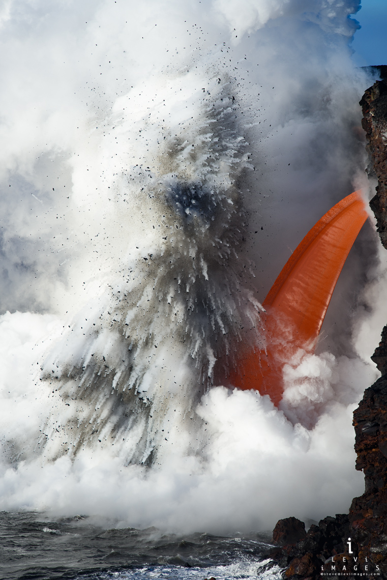 Rare lava fire hose explosively flows into the ocean, Hawaii Volcanoes National Park, Big Island, Hawaii