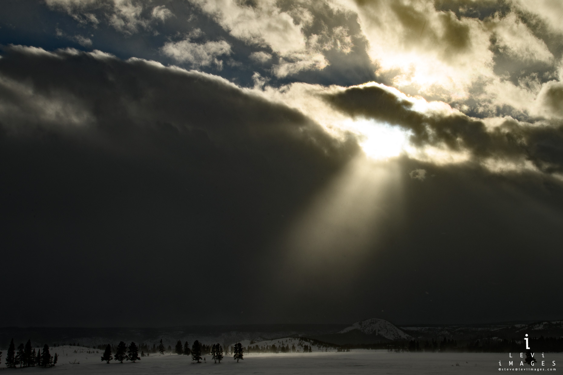 Dramatic god-beam landscape. Yellowstone National Park, Wyoming